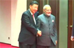 Chinas Xi Jinping greets PM  Modi with a handshake and smile ahead of SCO Summit